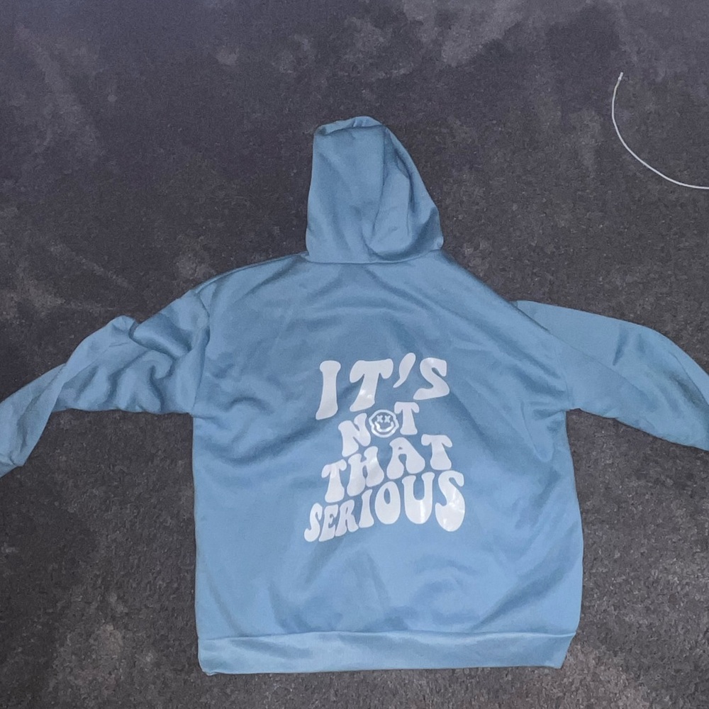 “it’s not that serious” sweatshirt